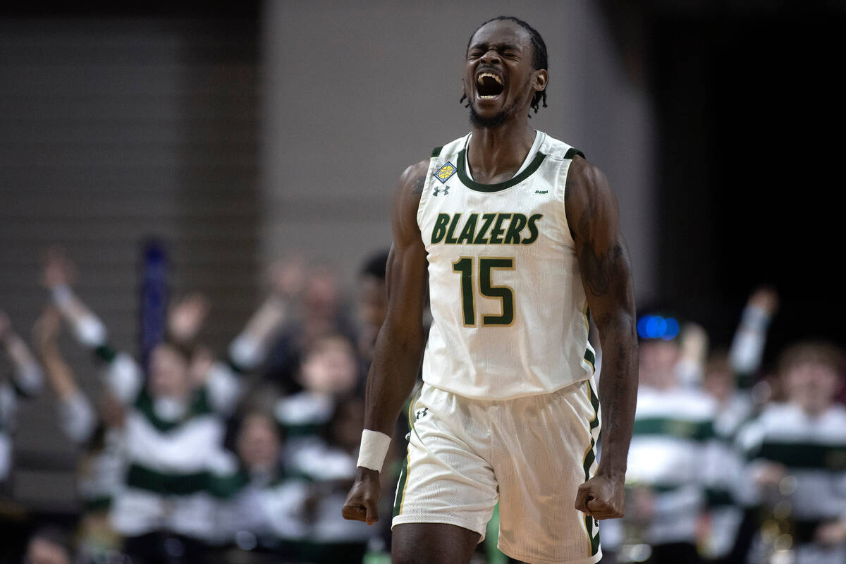 UAB Blazers forward Ty Brewer (15) celebrates after scoring a three-pointer during the second h ...