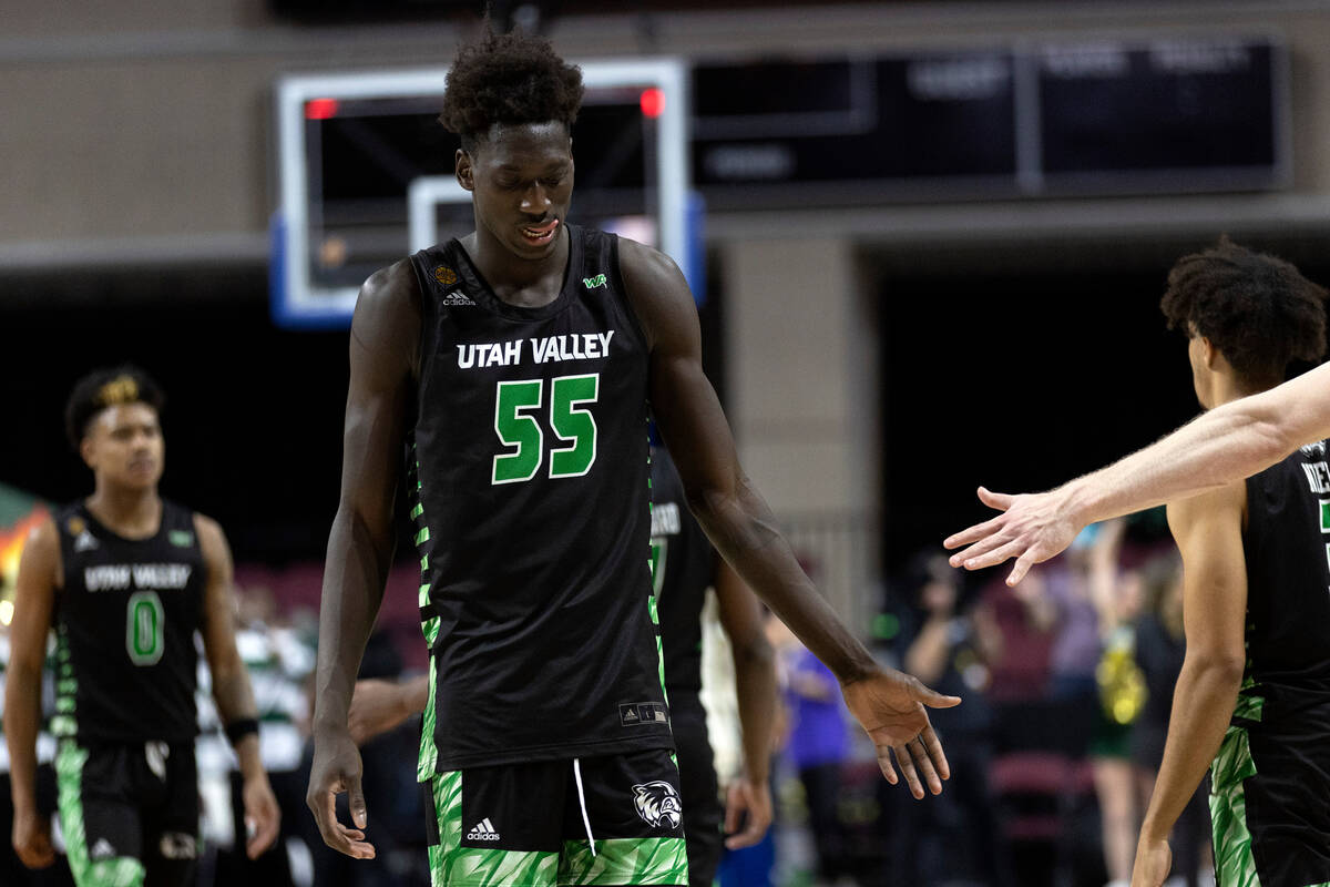 Utah Valley Wolverines center Aziz Bandaogo (55) walks off the court after losing an NCAA colle ...