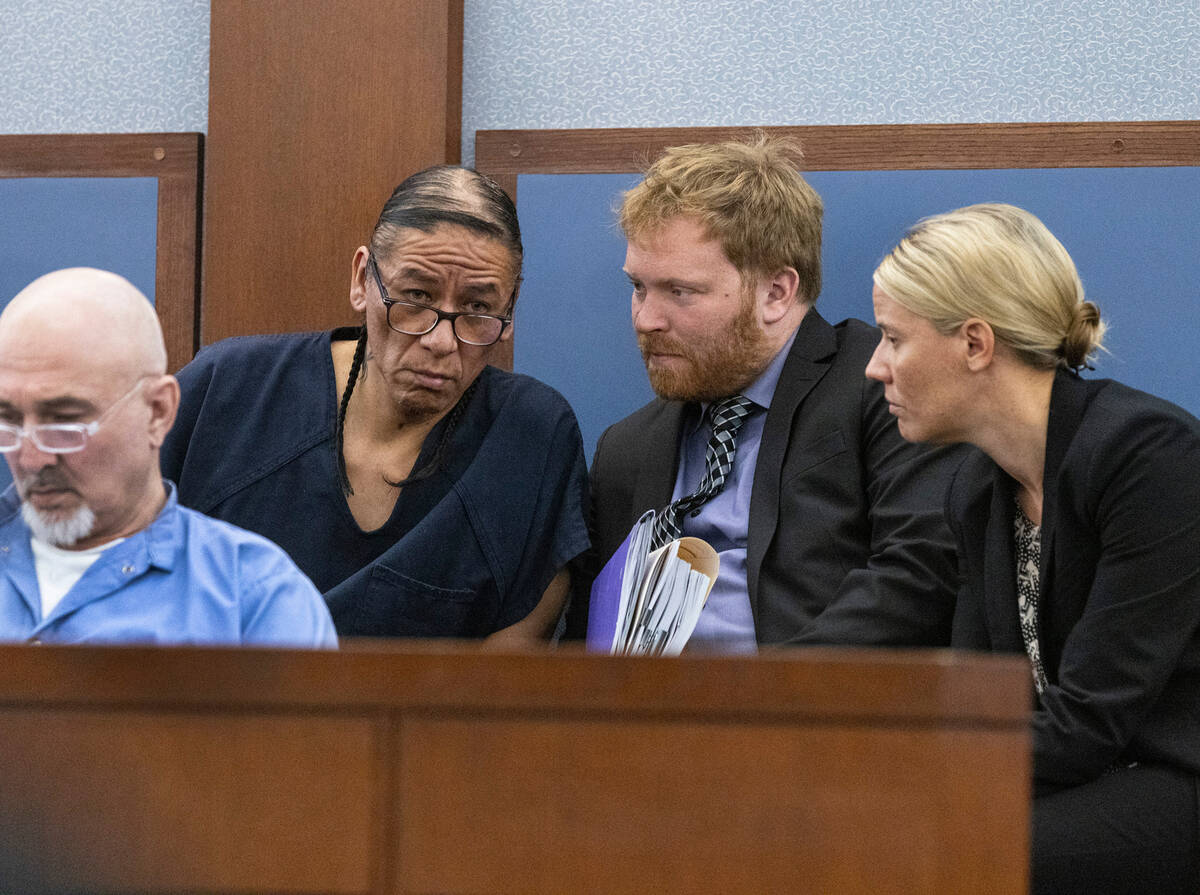Former actor Nathan Chasing Horse, left, listens to his attorneys Tyler Gaston, center, and Ann ...