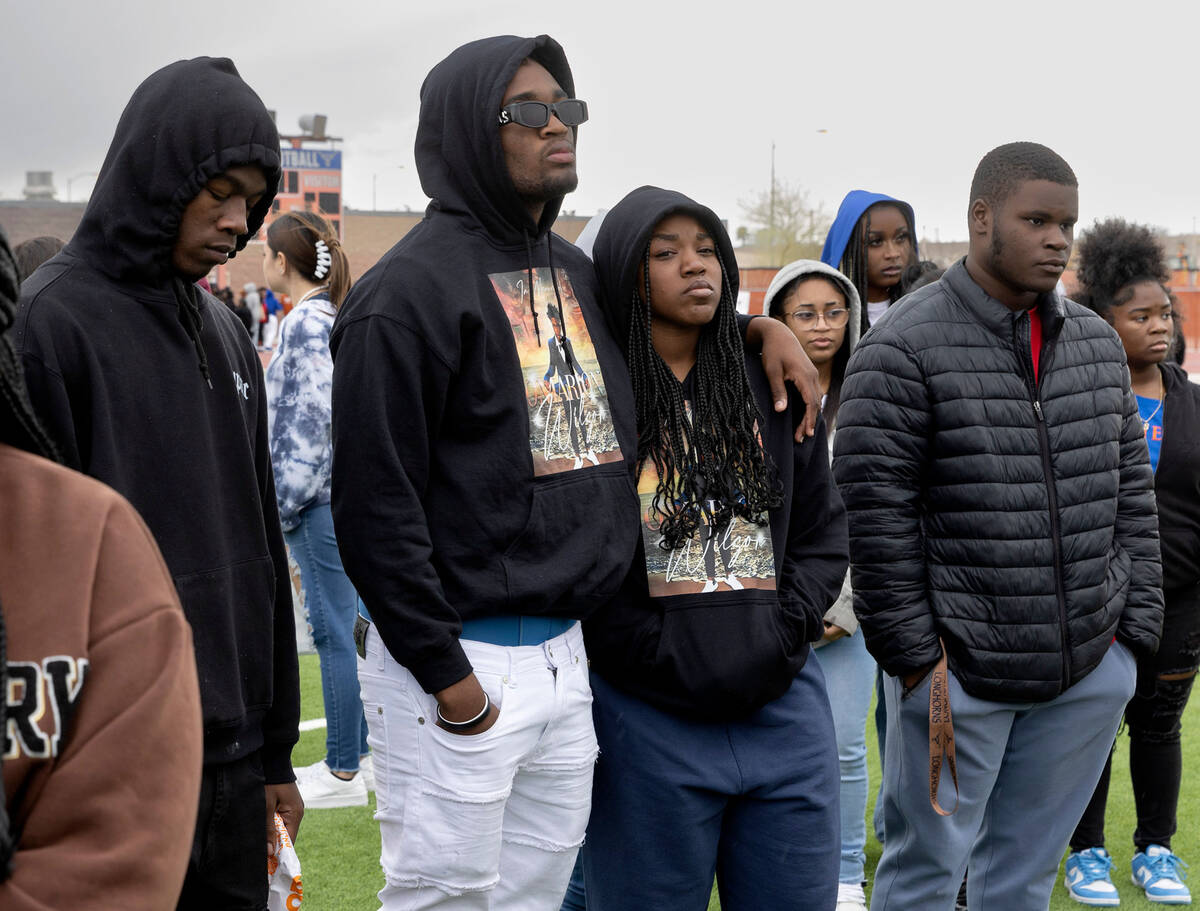 Loved ones of Omarion Wilson, 17, who was shot and killed in a birthday party in a hotel room o ...