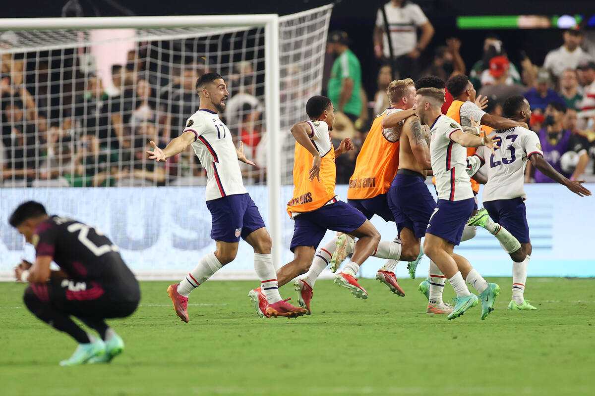 The United States celebrate their extra time win against Mexico 1-0 in the Concacaf Gold Cup fi ...