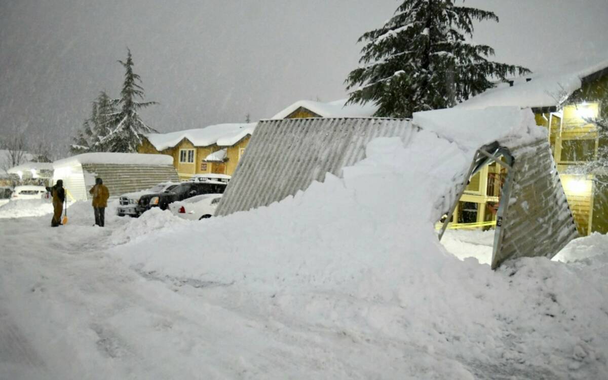 A pair of residents at the Cedar Park apartments in Grass Valley, Calif., take a break from sho ...