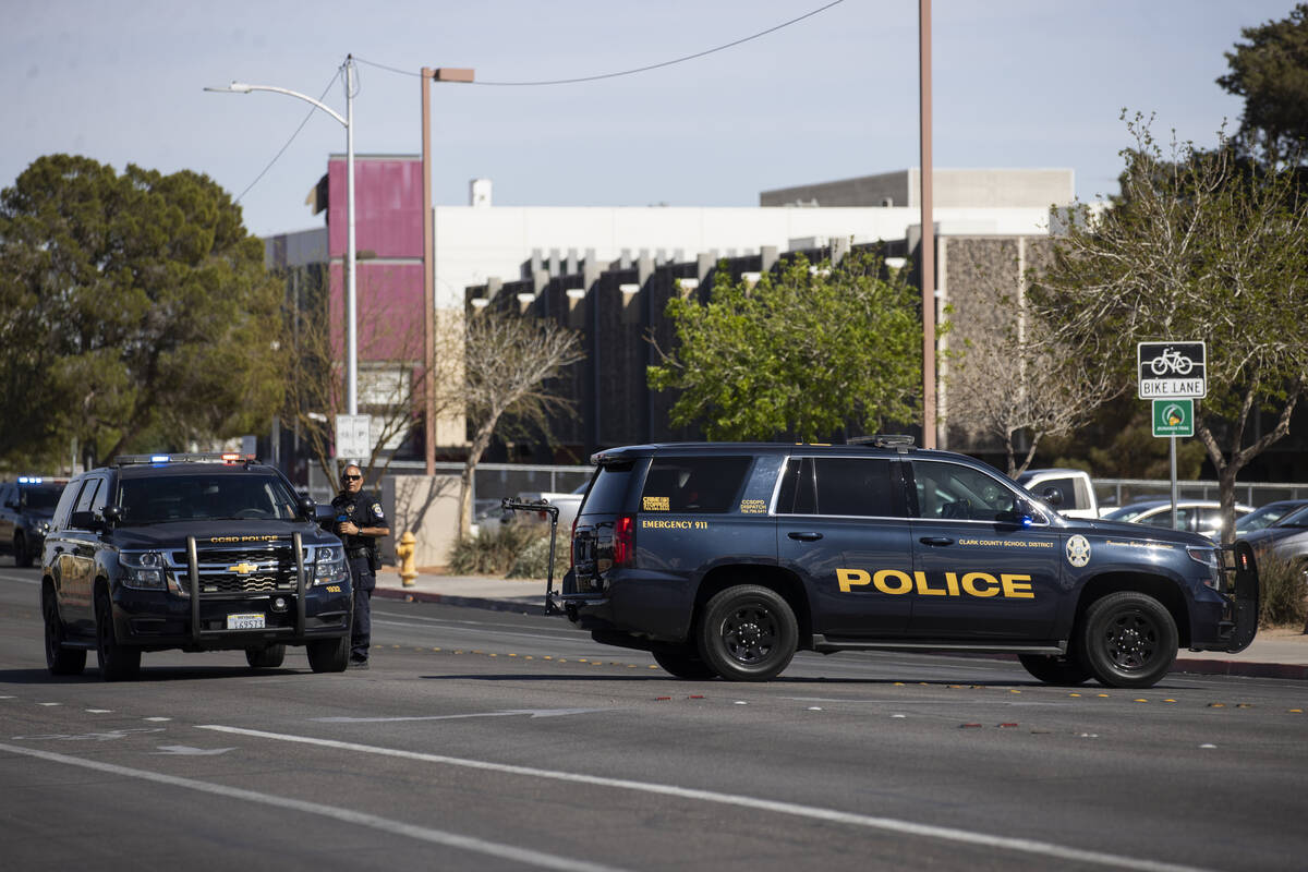 Police investigate a shooting at Western High School in Las Vegas, Tuesday, March 29, 2022. (Er ...