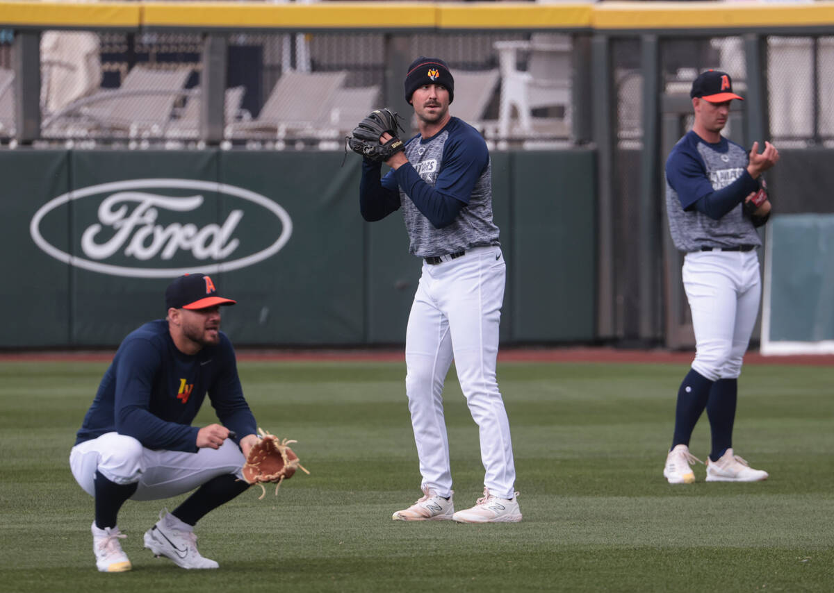 Las Vegas Aviators pitcher Bryce Conley, center, pitches during a media day practice at Las Veg ...