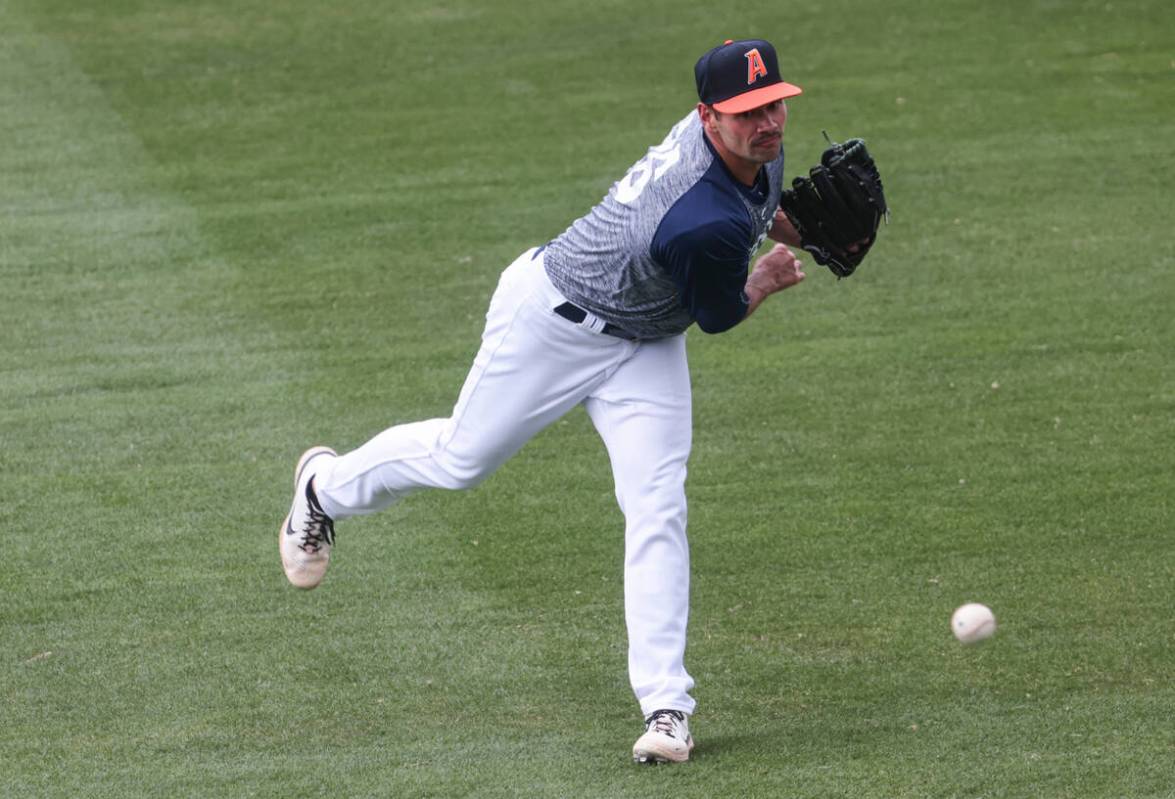 Las Vegas Aviators pitcher Garrett Acton pitches during a media day practice at Las Vegas Ballp ...