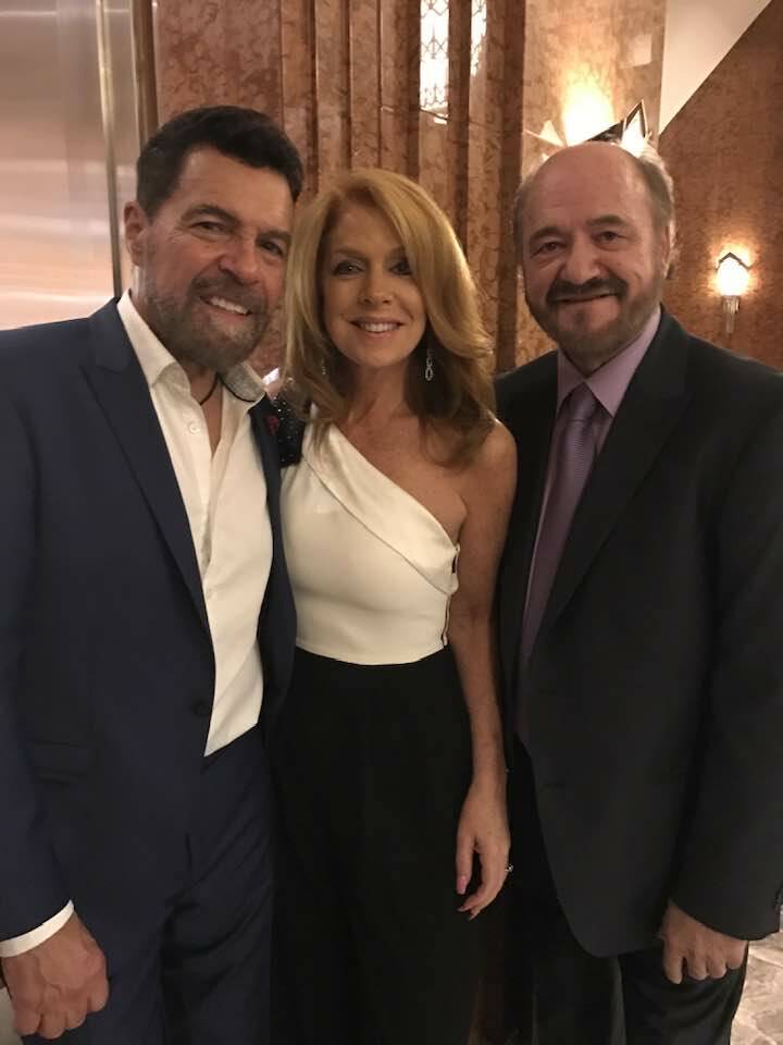 Clint Holmes, Kelly Clinton-Holmes and Bil Fayne are shown in an undated photo. Fayne, the popu ...