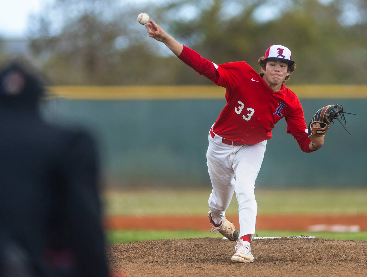 Liberty pitcher Dominic Ostolaza releases another ball while facing a Spring Valley batter duri ...