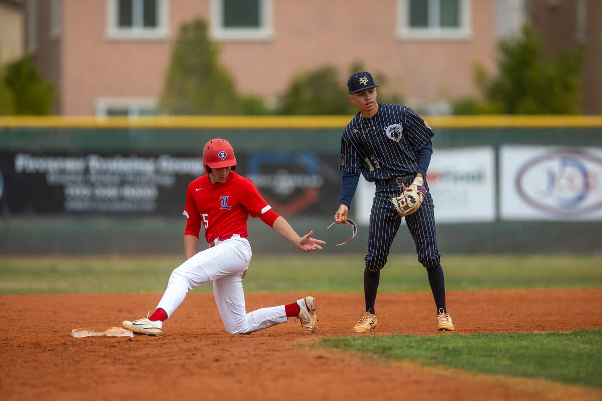 during the first inning of their NIAA baseball game on Thursday, March 30, 2023, in Henderson. ...