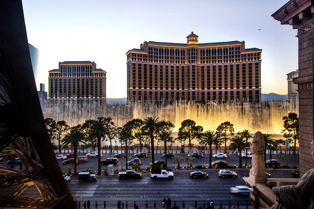 The Bellagio hotel-casino and its famous fountains are seen from the Chateau Rooftop at Paris L ...