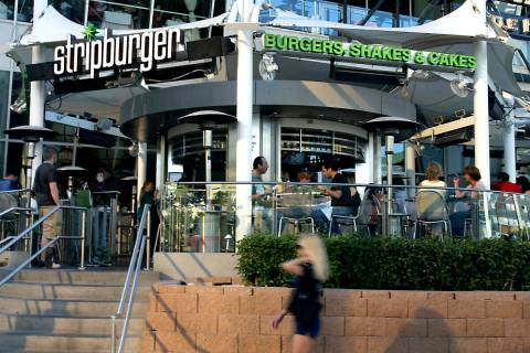 The Stripburger open-air restaurant at Fashion Show mall on the Las Vegas Strip is shown in thi ...