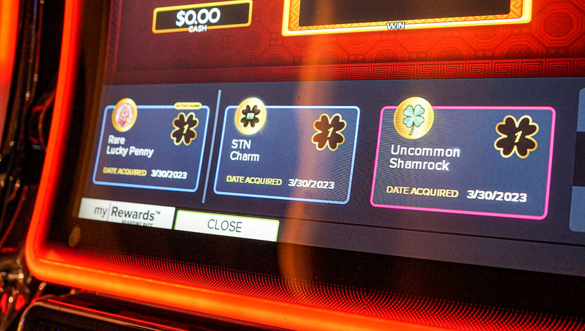STN Charms are displayed on a slot machine. Station Casinos debuted a new program that rewards ...