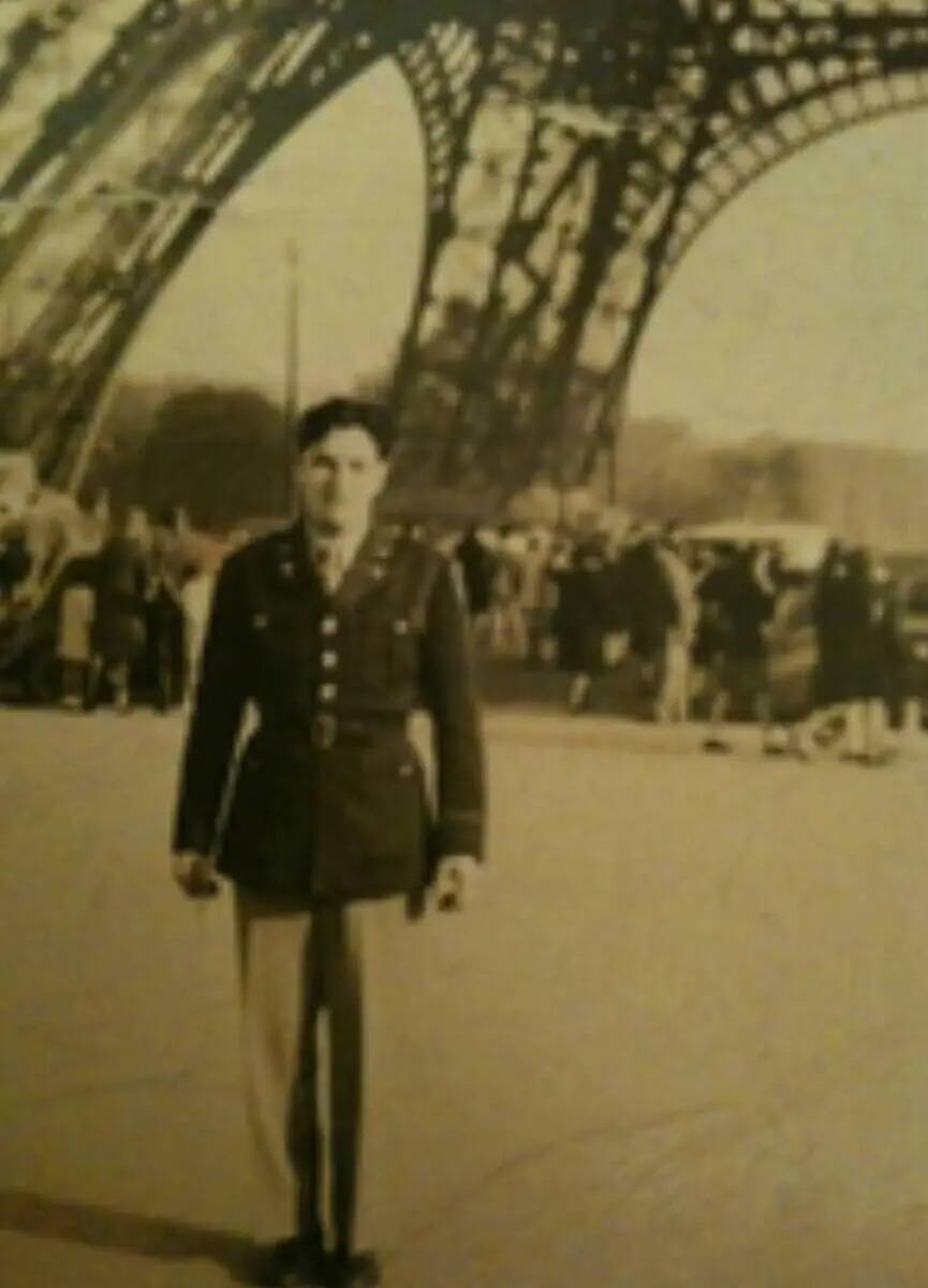 Herbert Muskin posed in front of the Eiffel Tower in while in service during Workd War II. (Dre ...
