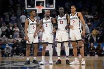 San Diego State guard Lamont Butler (5), guard Adam Seiko (2), forward Aguek Arop (33) and forw ...