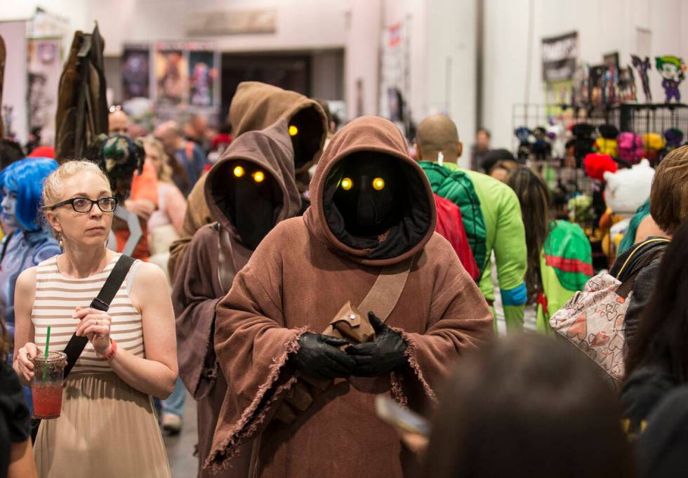 Characters inspired by the " Star Wars" series walk the North Halls during the Amazin ...
