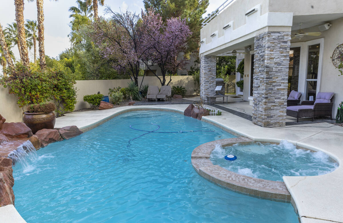 A backyard pool at a Workbnb home in Summerlin which can be a 30+ day rental for temporary work ...