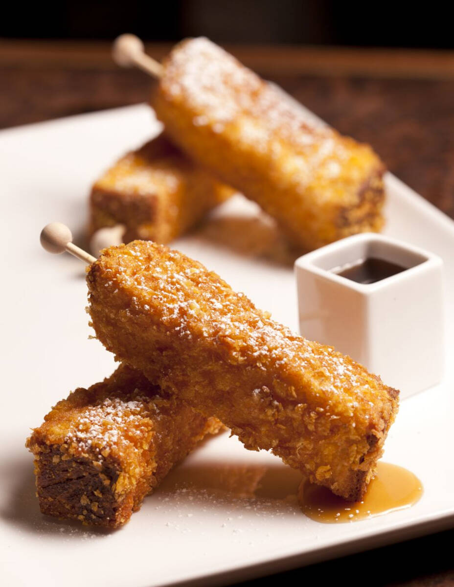 Batons of French toast are served at the passed small plates weekend brunch during spring 2023 ...