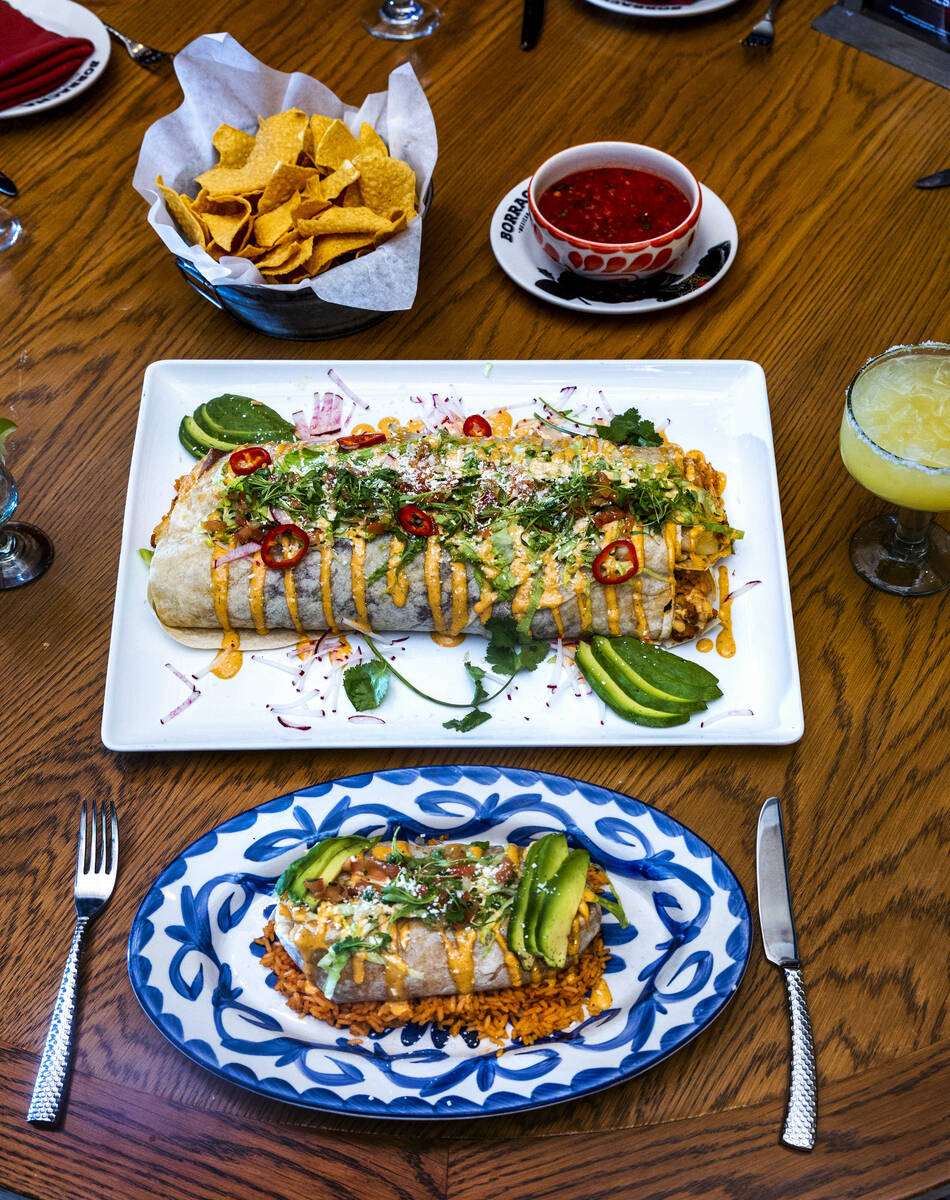 The 5-pound Dos Manos burrito, above, and a regular sized Achiote Chicken Burrito from Borracha ...