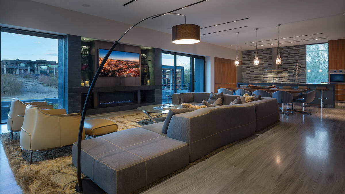 The main living space has a large living room area and the kitchen. It provides access to the s ...
