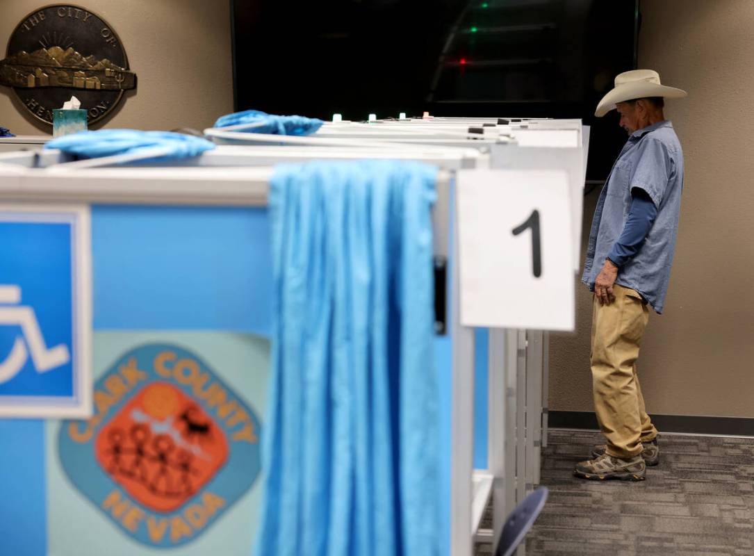 Clint Bentley votes at Henderson City Hall during a special election for Ward 1 City Council Mo ...