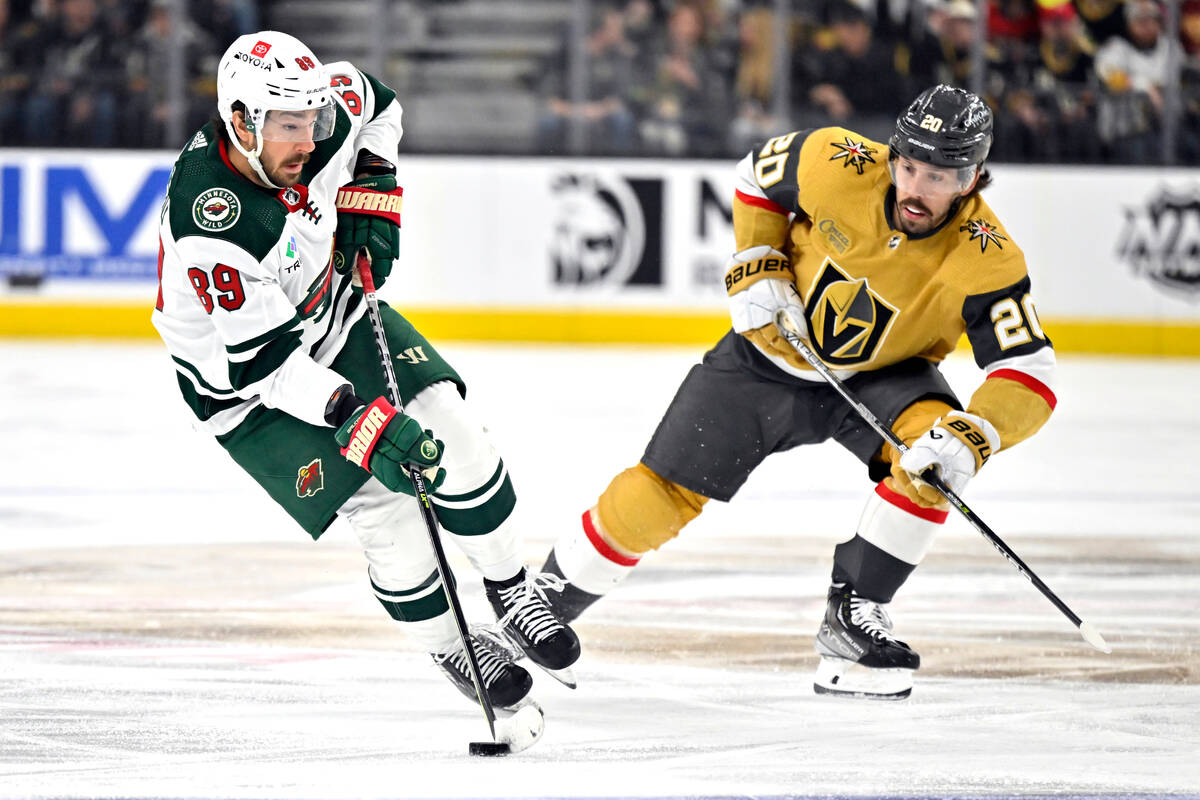 Minnesota Wild center Frederick Gaudreau (89) skates with the puck against Vegas Golden Knights ...