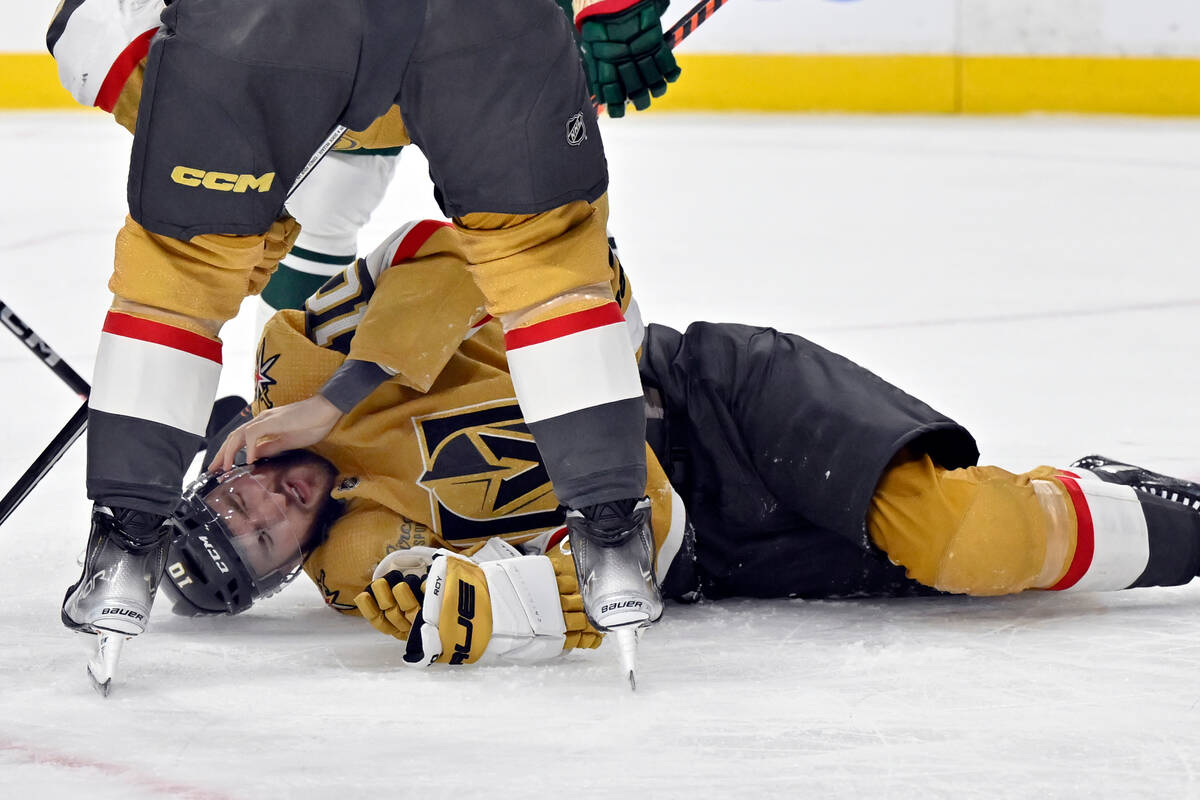 Vegas Golden Knights center Nicolas Roy (10) reacts after being hit with the puck during the se ...
