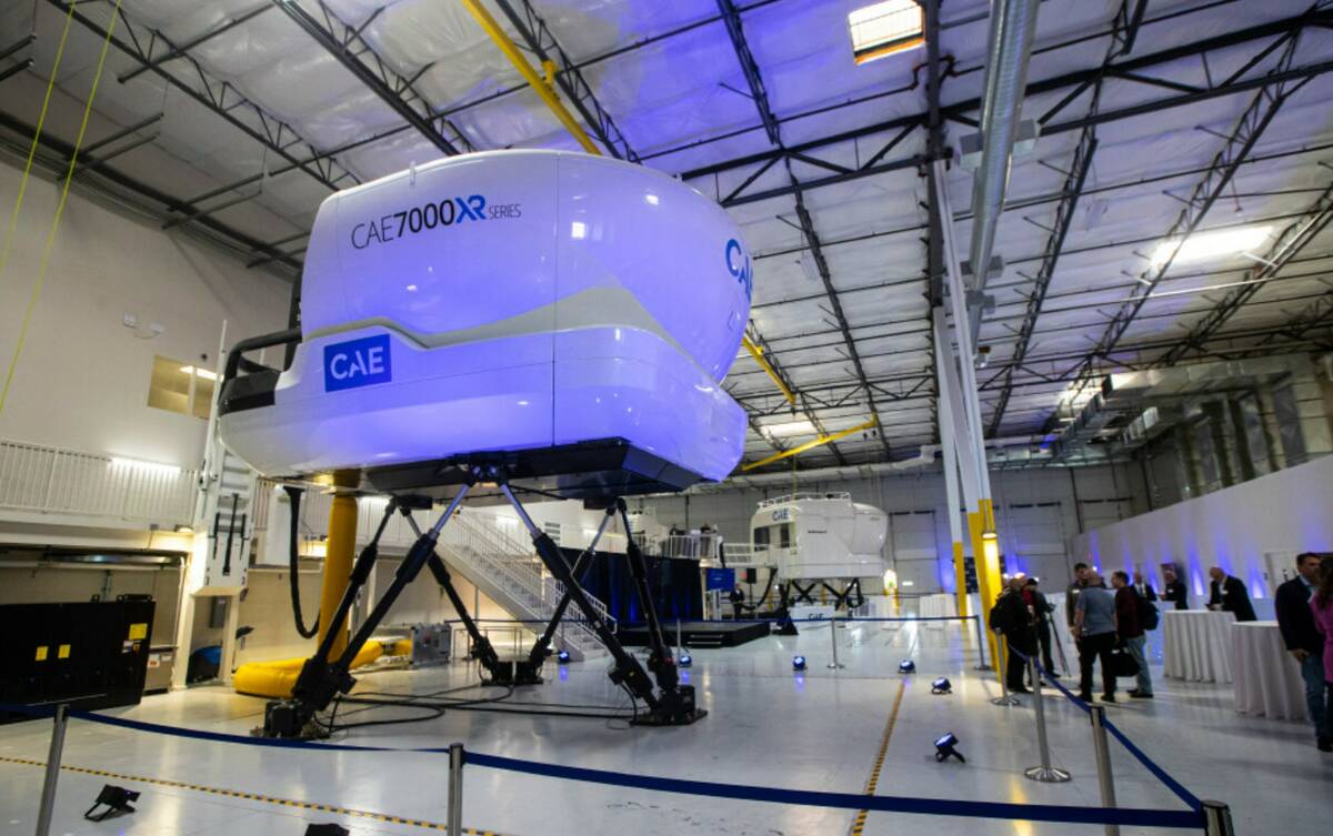 One of seven of the currently operating full-flight simulators is seen as people arrive for a r ...