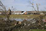 Tornadoes kill at least 18 in the South and Midwest