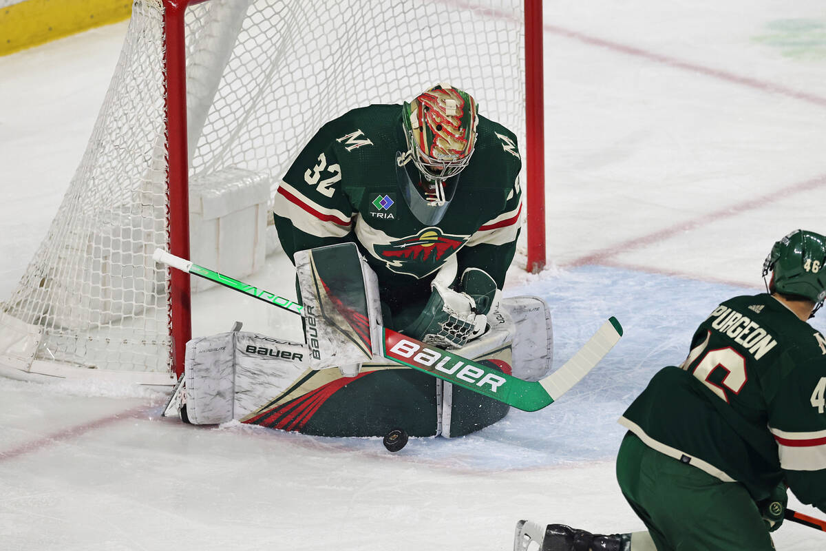 Minnesota Wild goaltender Filip Gustavsson (32) blocks the puck during the first period of an N ...