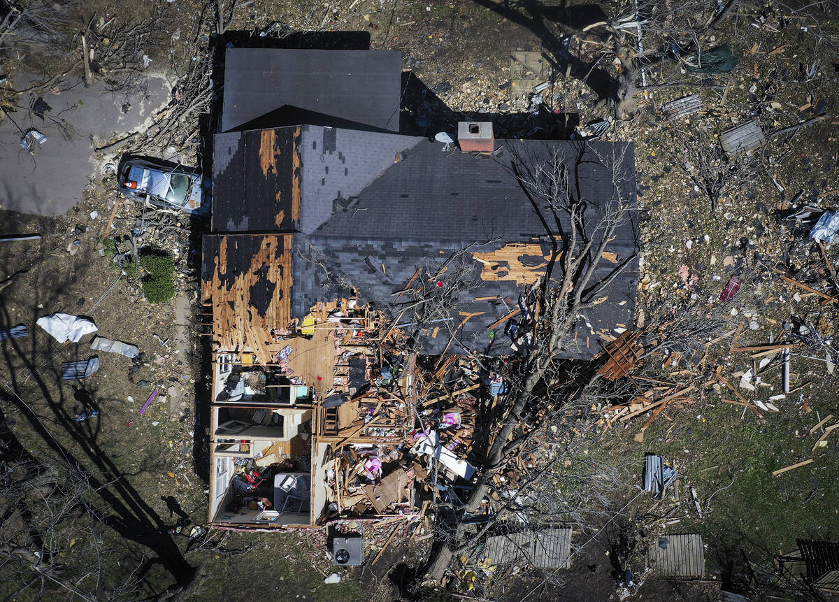 A house is destroyed from a tornado in Covington, Tenn., Saturday, April 1, 2023. Storms that ...
