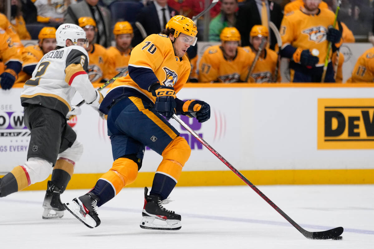 Nashville Predators left wing Egor Afanasyev (70) skates with the puck past Vegas Golden Knight ...