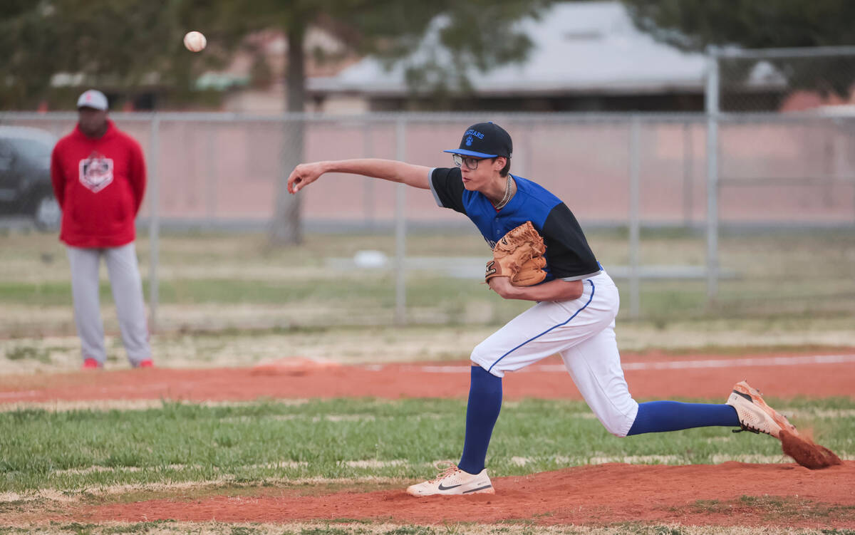 Desert Pines' Zachary Perez (22) pitches to Doral Academy during a baseball game at Desert Pine ...