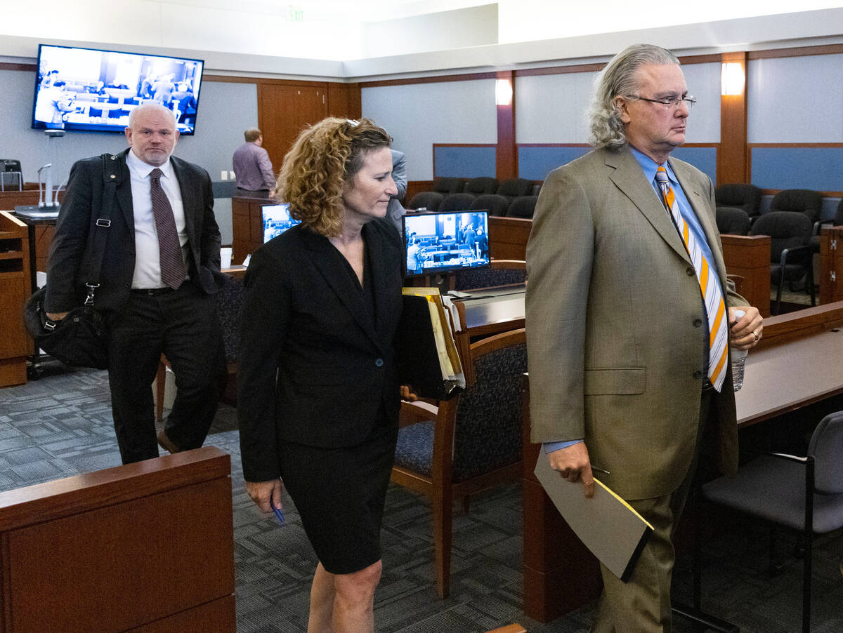 Attorneys representing the Review-Journal Joel Tasca, left, Ashley Kissinger, center, and David ...