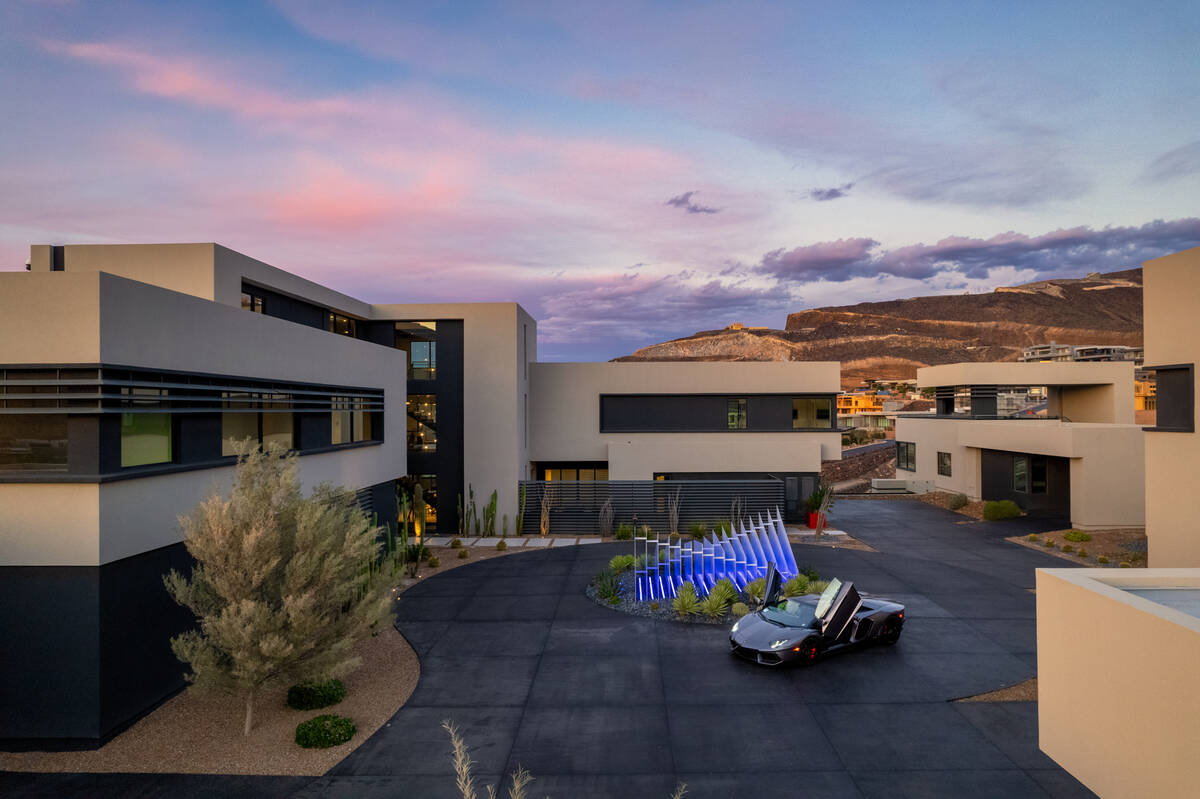 A mansion at 750 Dragon Ridge Drive in Henderson, seen here, is listed as a rental for $100,000 ...