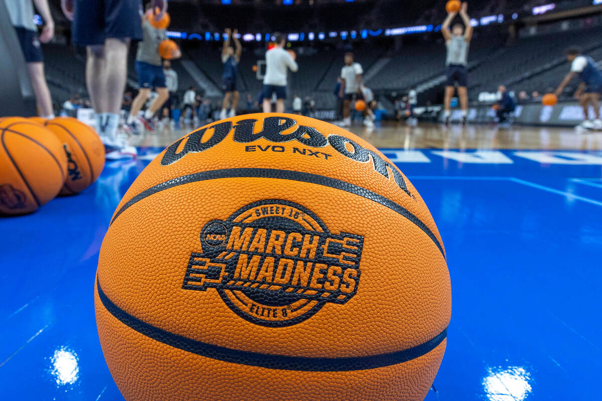 UConn players shoot around during the West Regional practice for the Sweet 16 games at the T-Mo ...