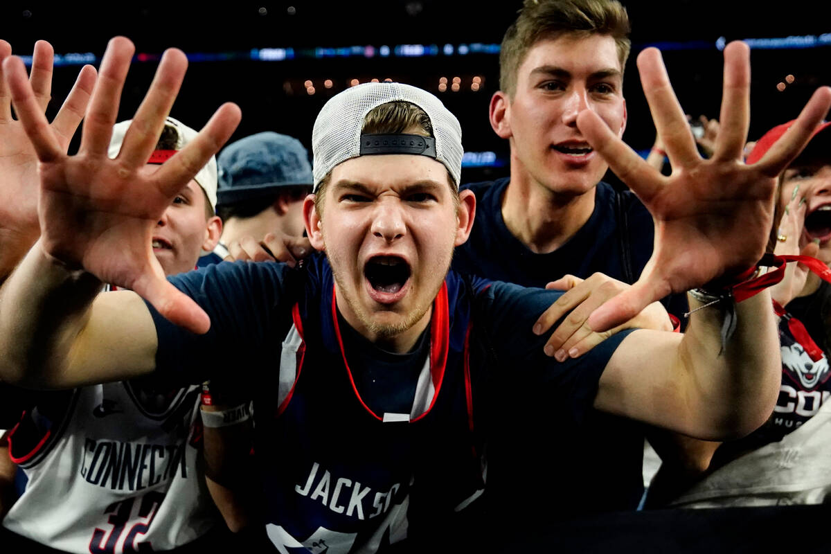 Connecticut fans cheer before the men's national championship college basketball game against S ...
