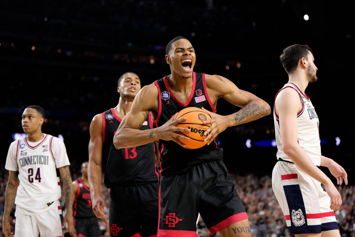 San Diego State forward Keshad Johnson celebrates after scoring against Connecticut during the ...