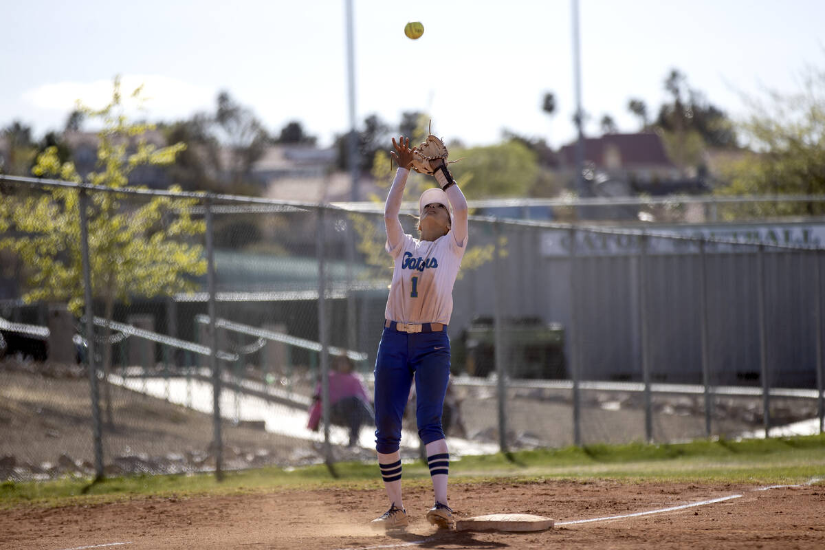Green Valley’s Gabby Machida reaches to catch a fly ball hit by Faith Lutheran during a ...