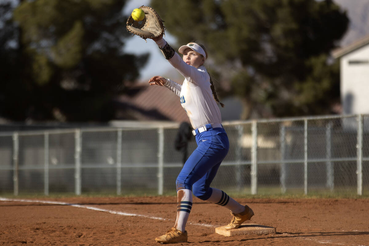 Green Valley’s Aspyn Beattie reaches to catch for an out against Faith Lutheran during a ...