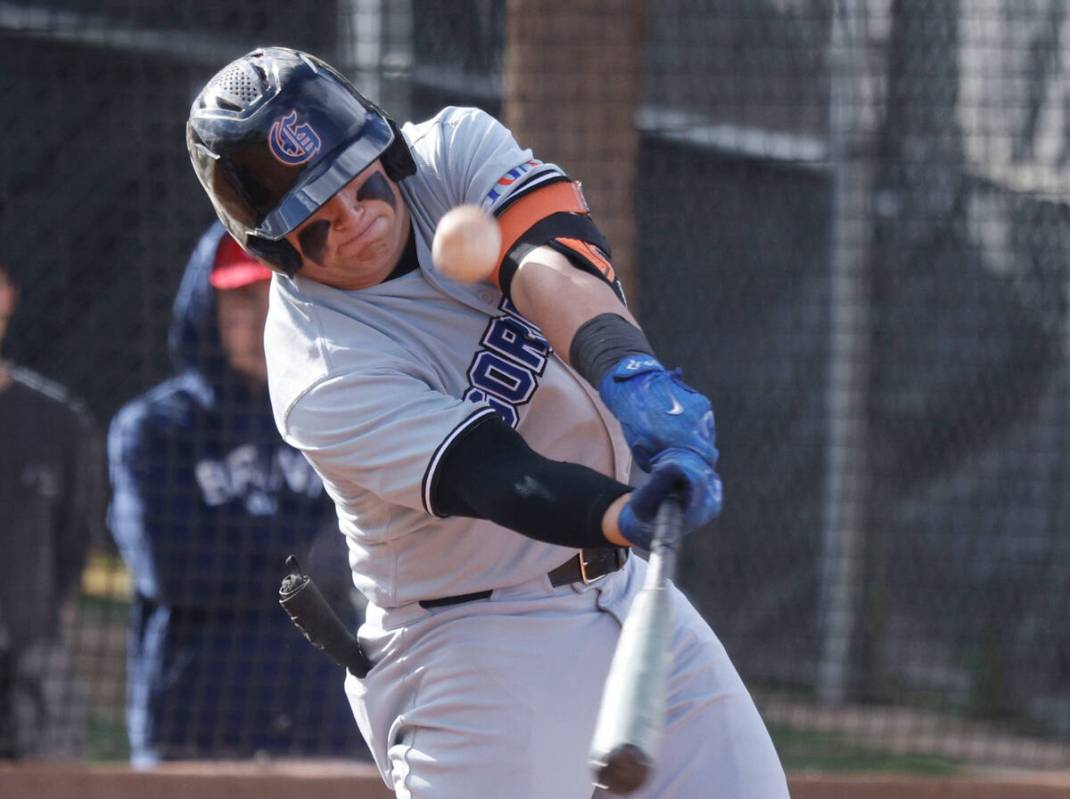 Bishop Gorman's Gunnar Myro (8) hits a foul ball during the fourth inning of a baseball game ag ...