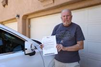 Bruce Kehring holds his letter from DETR claiming he owes $10,032 because of a “base period w ...