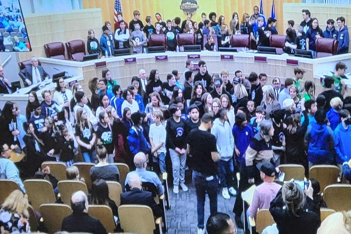 Students on several Henderson school robotics teams piled into the City Council chambers to be ...