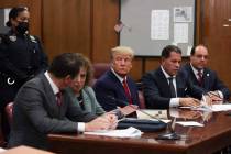 Former President Donald Trump appears in court for his arraignment on charges related to falsif ...