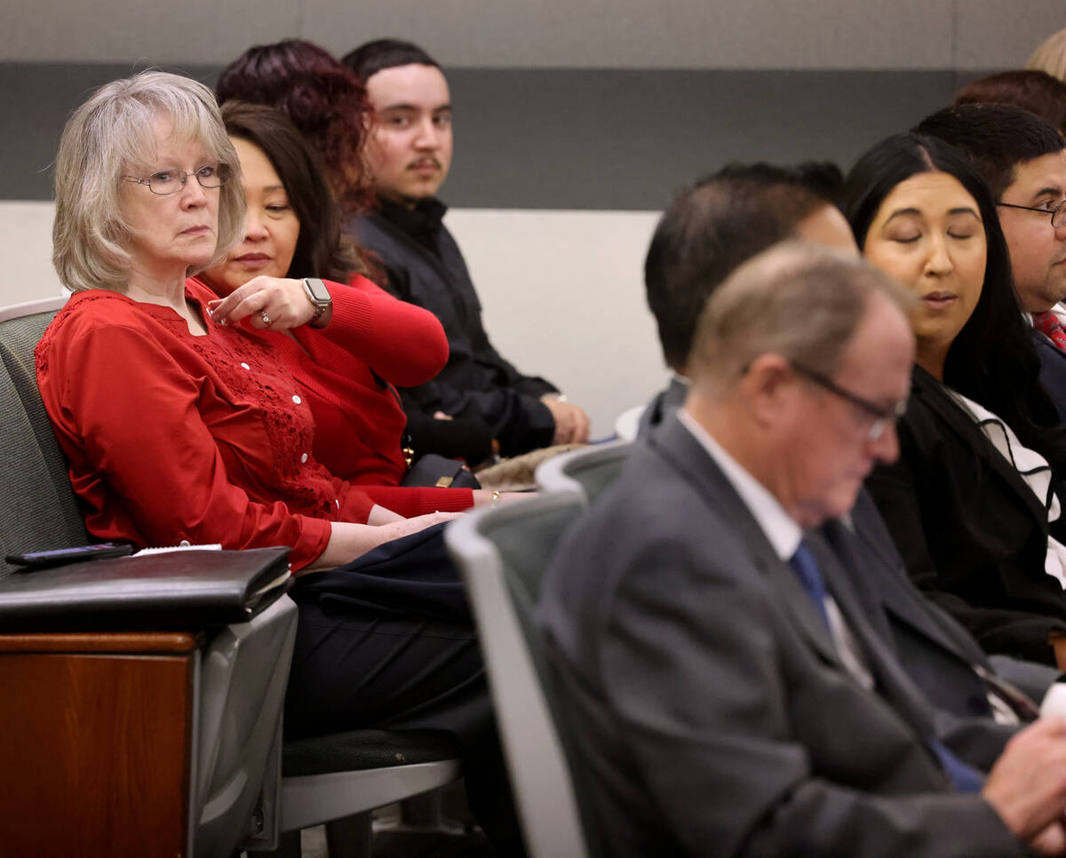 Clark County Administrator Rita Reid, left, watches in court during a hearing at the Regional J ...