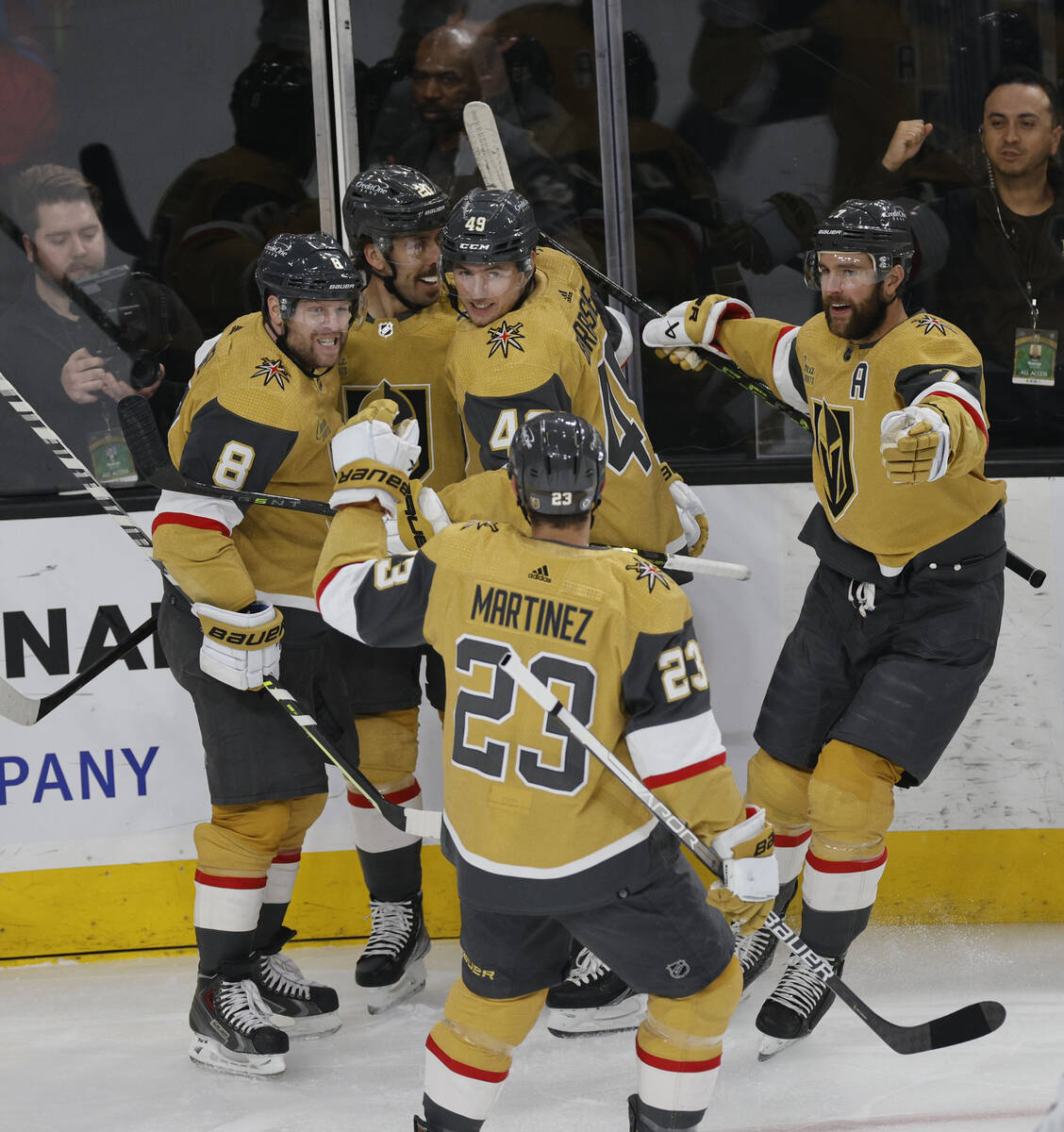 Golden Knights center Ivan Barbashev (49) celebrates with his teammates after scoring against L ...