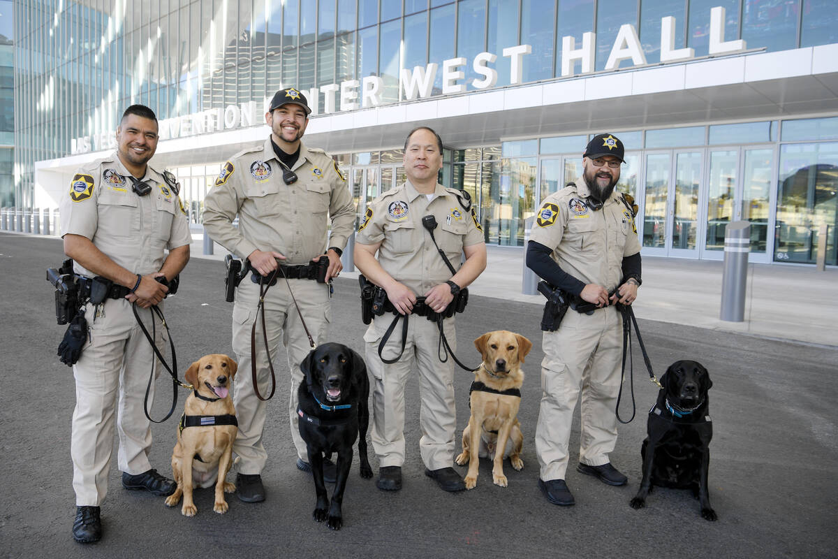 LVCVA Canine Officers and their dogs, from left, Arturo Iturrios Castellanos and Reba, Kevin Kl ...