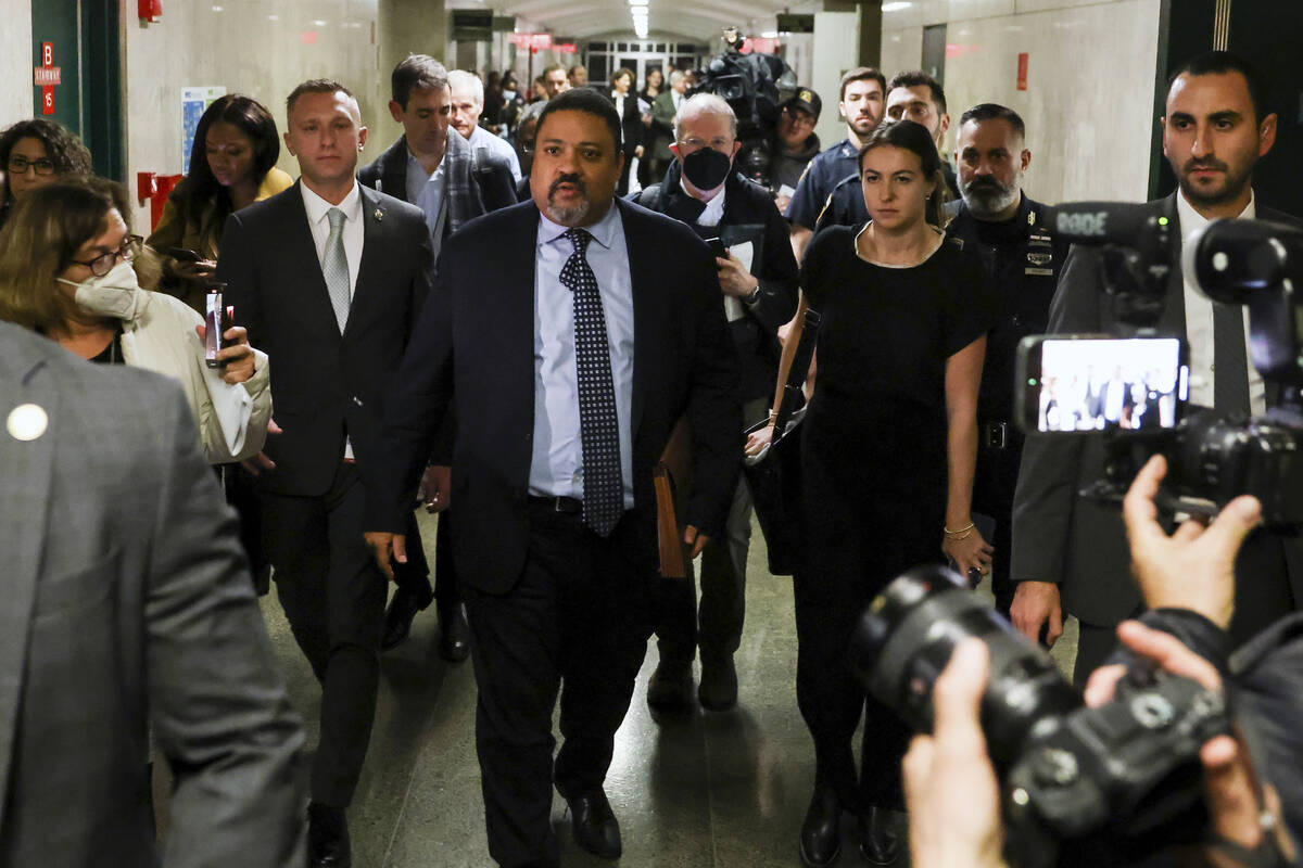 Manhattan District Attorney Alvin Bragg exits the courtroom after the jury found the Trump Orga ...