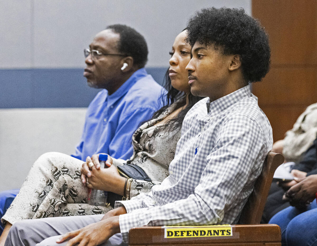 UNLV basketball recruit Zaon Collins, center, who is accused of causing a deadly crash two year ...