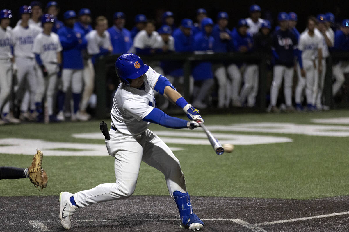 Bishop Gorman’s Gunnar Myro bats against Basic during a high school baseball championshi ...