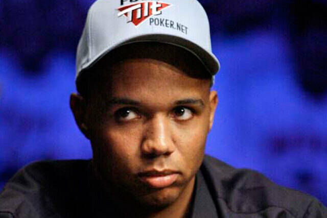 Phil Ivey looks up during a hand at the final table of the World Series of Poker at the Rio in ...