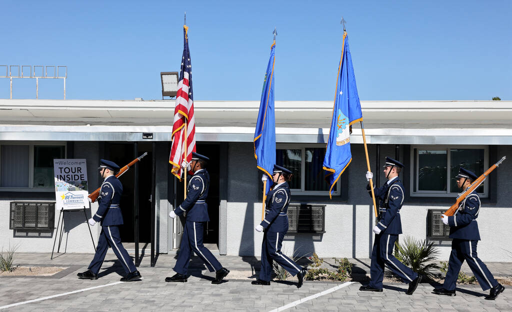 Members of the Nellis Air Force Base Color Guard present the colors at a ribbon-cutting ceremon ...